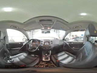 2013 Volkswagen Tiguan SE z VIN WVGBV3AX1DW579506, wystawiony jako Copart lot #52719575 z przebiegiem 163 471 mil mil oraz Szkoda całkowita • Salvage title. Historia ofert i sprzedaży dostępna na DreamBid. Obrazek 14.