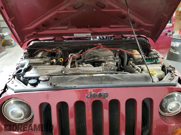 2012 Jeep Wrangler Unlimited Sport z VIN 1C4BJWDG8CL282181, wystawiony jako Copart lot #53863375 z przebiegiem 92 984 mil mil oraz Szkoda całkowita • Salvage title. Historia ofert i sprzedaży dostępna na DreamBid. Obrazek 12.