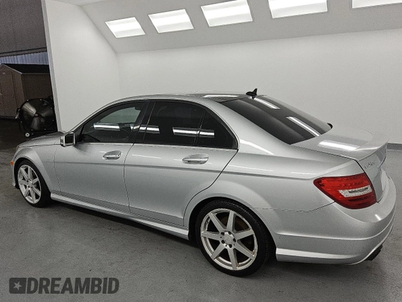 2014 Mercedes-Benz C 250 Sport with VIN WDDGF4HB4EG242305, listed as a Copart auction lot 61692835 with 158,590 mi miles and Clean title. Bid and sale history available at DreamBid. Image 2.