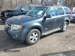 2008 Ford Escape XLT with VIN 1FMCU931X8KA86343, listed as a IAAI auction lot 42036419 with 146,836 mi miles. Bid and sale history available at carsss.com. Image 2.