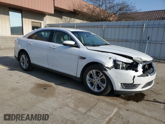 2016 Ford Taurus SEL with VIN 1FAHP2H89GG122884, listed as a Copart auction lot 53597595 with 128,627 mi miles and Salvage title. Bid and sale history available at DreamBid. Image 4.