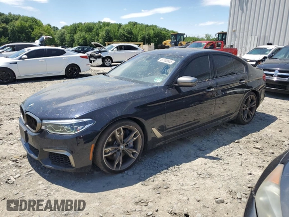 2018 BMW 5 Series M550i xDrive with VIN WBAJB9C56JB286479, listed as a Copart auction lot 57108645 with 71,782 mi miles and Salvage title. Bid and sale history available at DreamBid. Image 1.