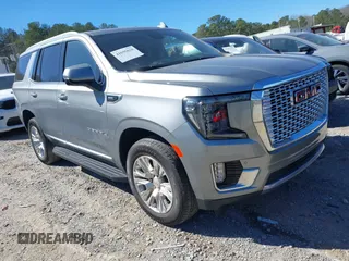 2023 GMC Yukon Denali with VIN 1GKS2DKL9PR250395, listed as a IAAI auction lot 41695028 with 32,318 mi miles. Bid and sale history available at carsss.com. Image 1.