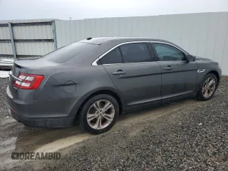 2018 Ford Taurus SE z VIN 1FAHP2D88JG129449, wystawiony jako Copart lot #56127615 z przebiegiem 127 589 mil mil oraz Czysty tytuł • Clean title. Historia ofert i sprzedaży dostępna na DreamBid. Obrazek 3.