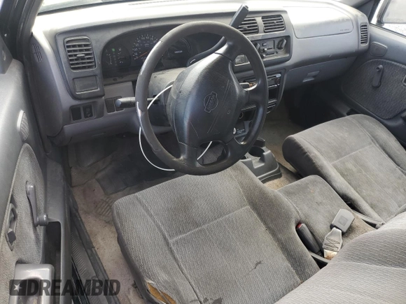 1999 Nissan Frontier XE with VIN 1N6DD26S6XC332458, listed as a Copart auction lot 48028715 with 182,706 mi miles and Salvage title. Bid and sale history available at DreamBid. Image 8.