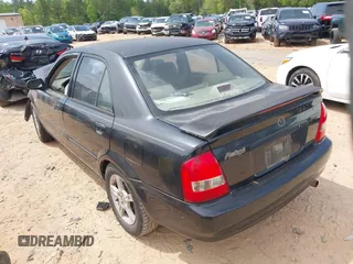 2003 Mazda Protege DX with VIN JM1BJ225630146692, listed as a IAAI auction lot 42017013 with 239,687 mi miles and . Bid and sale history available at DreamBid. Image 3.