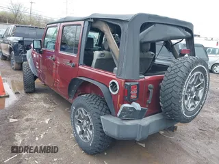 2007 Jeep Wrangler Unlimited Sahara with VIN 1J4GA59177L162022, listed as a IAAI auction lot 41887599 with 207,358 mi miles and . Bid and sale history available at DreamBid. Image 3.