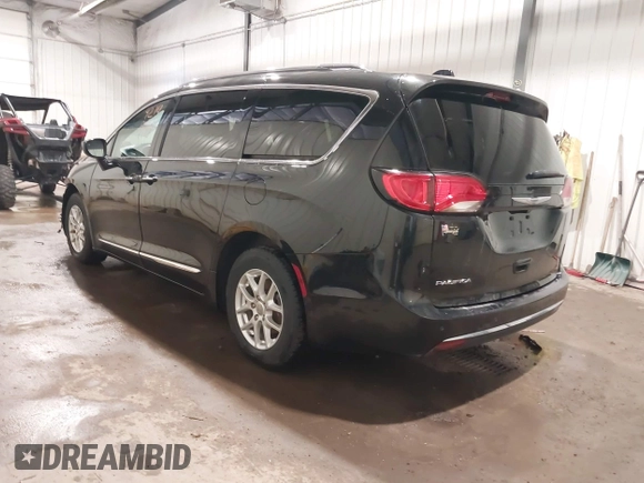 2020 Chrysler Pacifica Touring L with VIN 2C4RC1BG9LR140072, listed as a IAAI auction lot 42199118 with 93,557 mi miles and . Bid and sale history available at DreamBid. Image 3.