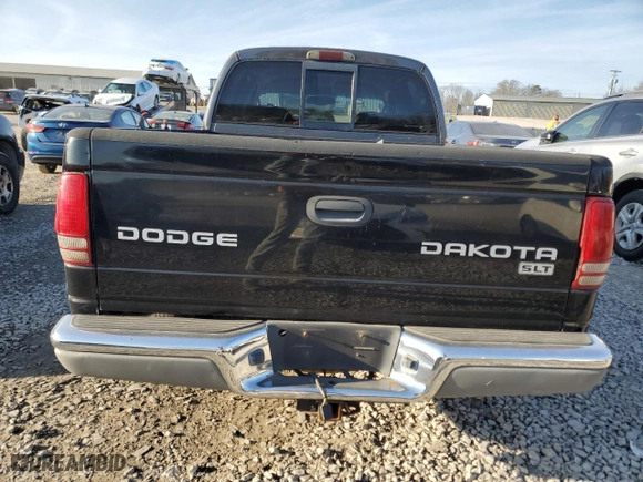 2001 Dodge Dakota Sport with VIN 1B7HL2ANX1S325003, listed as a Copart auction lot 83257074 with 234,873 mi miles and Salvage Title. Bid and sale history available at carsss.com. Image 6.