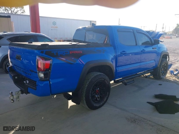 2019 Toyota Tacoma 4WD SR with VIN 5TFCZ5AN9KX197898, listed as a IAAI auction lot 41304019 with 111,995 mi miles. Bid and sale history available at carsss.com. Image 4.