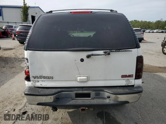 2002 GMC Yukon SLE z VIN 1GKEC13V62R189525, wystawiony jako Copart lot #55197575 z przebiegiem Nie podano mil oraz Szkoda całkowita • Salvage title. Historia ofert i sprzedaży dostępna na DreamBid. Obrazek 6.
