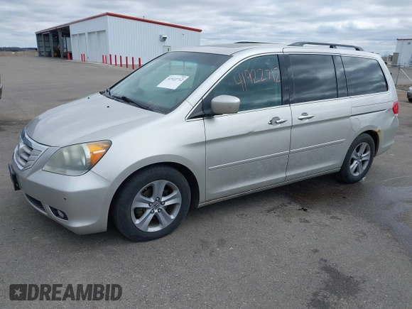 2008 Honda Odyssey Touring with VIN 5FNRL38928B109012, listed as a IAAI auction lot 41922712 with 241,589 mi miles. Bid and sale history available at carsss.com. Image 2.
