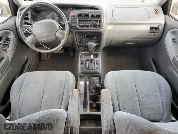 2002 Suzuki XL7 Standard z VIN JS3TX92V424130897, wystawiony jako Copart lot #84635434 z przebiegiem 208 447 mil mil oraz Szkoda całkowita • Salvage title. Historia ofert i sprzedaży dostępna na DreamBid. Obrazek 8.