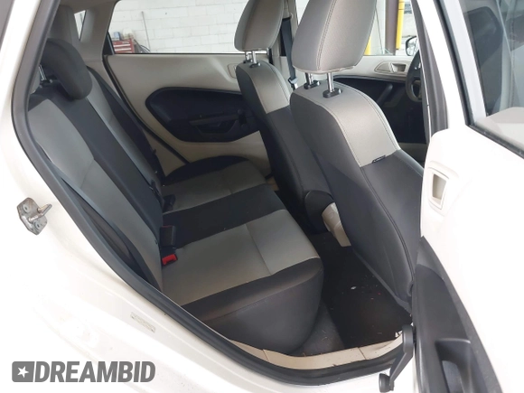 2013 Ford Fiesta S with VIN 3FADP4TJ4DM226897, listed as a IAAI auction lot 41916651 with 56,714 mi miles and . Bid and sale history available at DreamBid. Image 8.