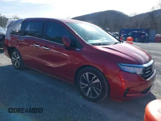 2022 Honda Odyssey Touring with VIN 5FNRL6H86NB022797, listed as a IAAI auction lot 41600900 with 70,653 mi miles and . Bid and sale history available at DreamBid. Image 1.