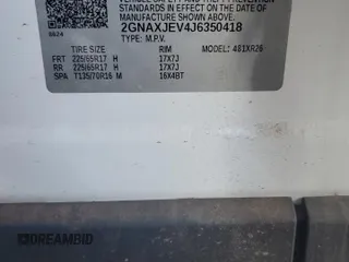 2018 Chevrolet Equinox LT z VIN 2GNAXJEV4J6350418, wystawiony jako Copart lot #56995065 z przebiegiem 49 600 mil mil oraz Szkoda całkowita • Salvage title. Historia ofert i sprzedaży dostępna na DreamBid. Obrazek 14.