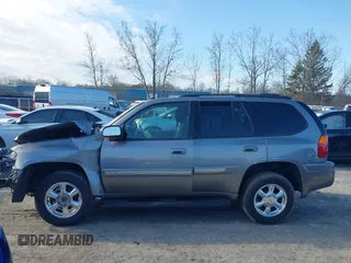 2005 GMC Envoy SLE with VIN 1GKDT13S852362380, listed as a IAAI auction lot 42031727 with 76,711 mi miles. Bid and sale history available at carsss.com. Image 15.