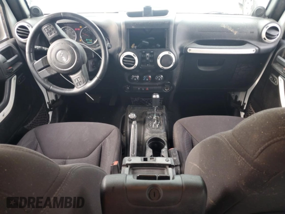 2013 Jeep Wrangler Unlimited Sport z VIN 1C4BJWDG0DL574795, wystawiony jako Copart lot #59230515 z przebiegiem 132 808 mil mil oraz Szkoda całkowita • Salvage title. Historia ofert i sprzedaży dostępna na DreamBid. Obrazek 8.
