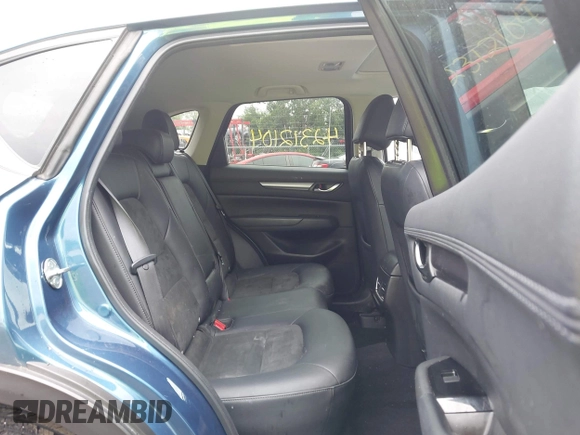 2017 Mazda CX-5 Touring z VIN JM3KFBCL9H0224962, wystawiony jako IAAI lot #42312104 z przebiegiem Nie podano mil oraz . Historia ofert i sprzedaży dostępna na DreamBid. Obrazek 8.