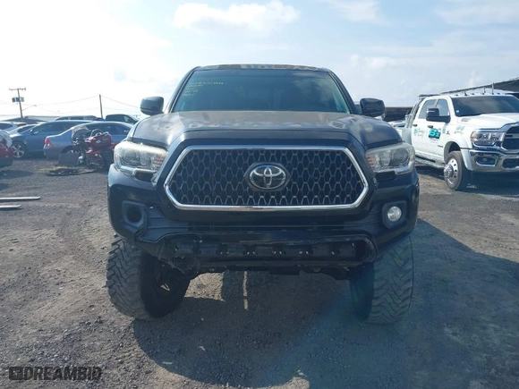 2016 Toyota Tacoma SR with VIN 3TMCZ5AN0GM023313, listed as a IAAI auction lot 41357990 with 103,335 mi miles. Bid and sale history available at carsss.com. Image 12.
