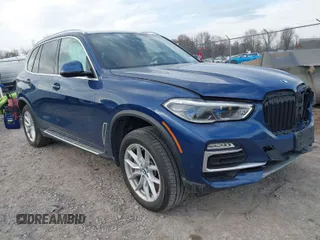 2021 BMW X5 xDrive45e with VIN 5UXTA6C07M9F32034, listed as a IAAI auction lot 41832720 with 28,453 mi miles. Bid and sale history available at carsss.com. Image 1.