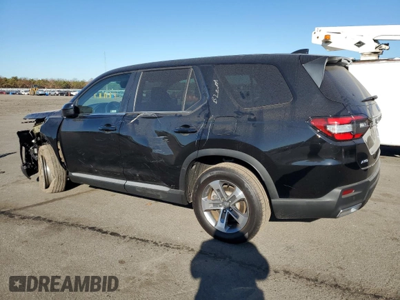 2023 Honda Pilot EX-L 7 Passenger with VIN 5FNYG1H52PB013462, listed as a Copart auction lot 79597574 with 25,302 mi miles and Salvage Title. Bid and sale history available at carsss.com. Image 2.