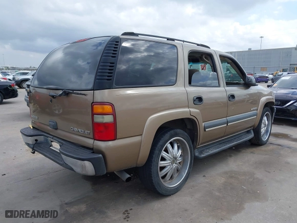 2003 Chevrolet Tahoe LS with VIN 1GNEC13V33J338251, listed as a IAAI auction lot 41634451 with 265,779 mi miles. Bid and sale history available at carsss.com. Image 4.