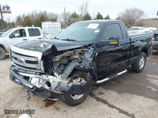 2014 Ford F-150 XL with VIN 1FTMF1CM2EFA69992, listed as a IAAI auction lot 41738432 with 107,778 mi miles. Bid and sale history available at carsss.com. Image 2.