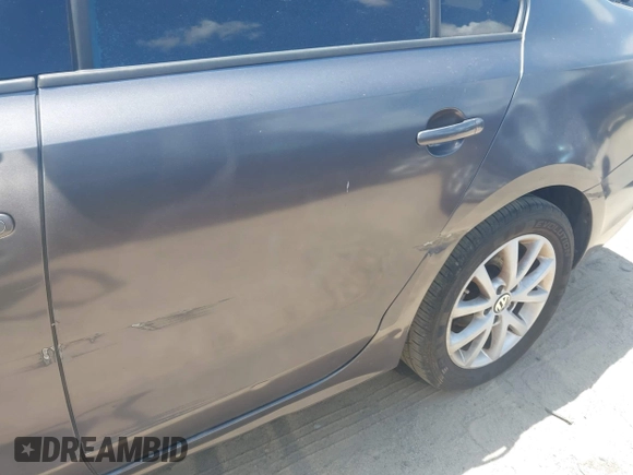 2015 Volkswagen Jetta SE with VIN 3VWD17AJ1FM237596, listed as a IAAI auction lot 42821848 with 172,633 mi miles and . Bid and sale history available at DreamBid. Image 13.