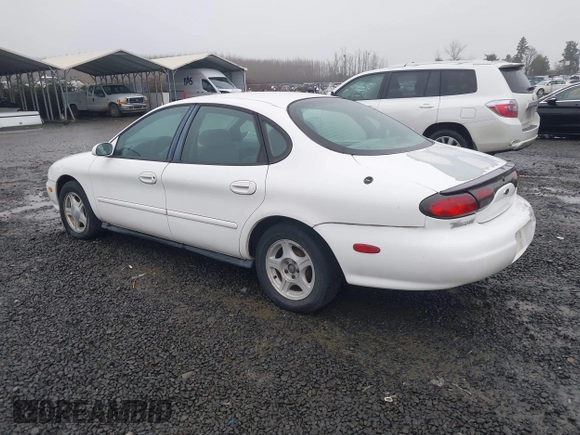 1999 Ford Taurus SE z VIN 1FAFP53U5XA269767, wystawiony jako IAAI lot #41504302 z przebiegiem 182 198 mil mil oraz . Historia ofert i sprzedaży dostępna na DreamBid. Obrazek 3.