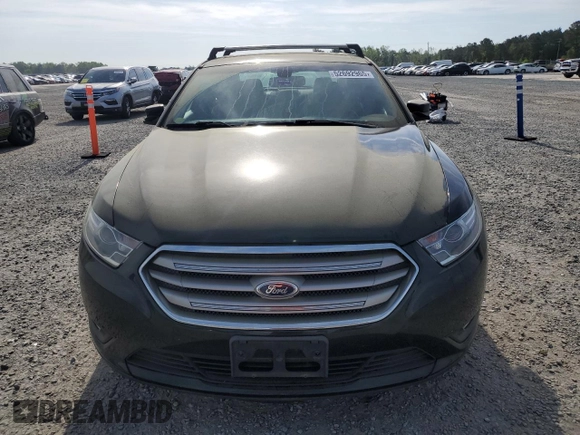 2014 Ford Taurus SEL with VIN 1FAHP2E87EG151866, listed as a Copart auction lot 52692965 with 201,680 mi miles and Clean Title. Bid and sale history available at DreamBid. Image 5.