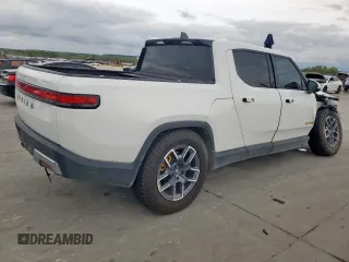 2022 Rivian R1T Adventure z VIN 7FCTGAAA8NN013508, wystawiony jako Copart lot #50834485 z przebiegiem Nie podano mil oraz Szkody całkowita. Historia ofert i sprzedaży dostępna na DreamBid. Obrazek 3.
