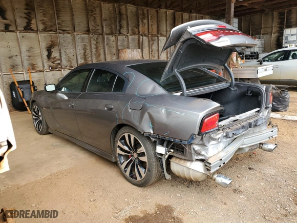 2012 Dodge Charger SRT8 with VIN 2C3CDXEJ1CH240058, listed as a Copart auction lot 73943004 with 72,013 mi miles and Salvage Title. Bid and sale history available at carsss.com. Image 2.