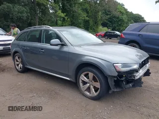 2013 Audi allroad A4 Premium Plus z VIN WA1UFAFL2DA203067, wystawiony jako IAAI lot #40288409 z przebiegiem 139 038 mil mil oraz . Historia ofert i sprzedaży dostępna na DreamBid. Obrazek 1.