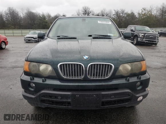 2003 BMW X5 4.4i with VIN 5UXFB33523LH41641, listed as a Copart auction lot 73943304 with 74,753 mi miles and Clean Title. Bid and sale history available at carsss.com. Image 5.