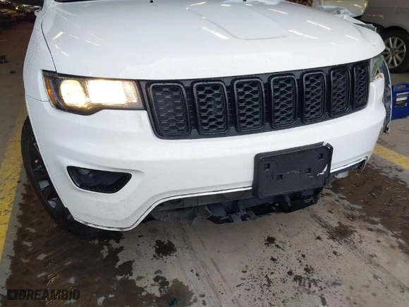 2019 Jeep Grand Cherokee Laredo E with VIN 1C4RJFAG1KC818289, listed as a IAAI auction lot 41602541 with 59,356 mi miles. Bid and sale history available at carsss.com. Image 22.