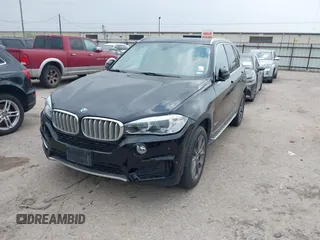 2014 BMW X5 xDrive35d with VIN 5UXKS4C56E0J93861, listed as a IAAI auction lot 41906775 with 149,263 mi miles. Bid and sale history available at carsss.com. Image 2.