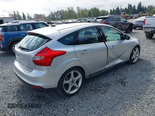 2014 Ford Focus Titanium with VIN 1FADP3N20EL160982, listed as a IAAI auction lot 42565322 with 112,551 mi miles and . Bid and sale history available at DreamBid. Image 4.