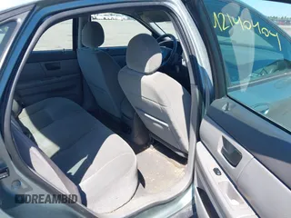 2005 Ford Taurus SE with VIN 1FAFP53U05A273576, listed as a IAAI auction lot 42140404 with 58,735 mi miles. Bid and sale history available at carsss.com. Image 8.