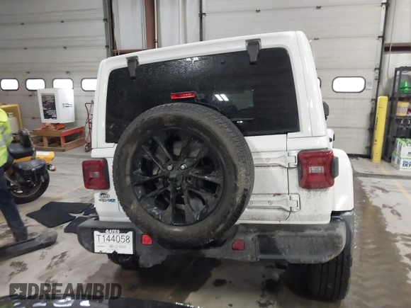 2021 Jeep Wrangler Unlimited Sahara with VIN 1C4JJXP60MW830307, listed as a IAAI auction lot 41869863 with 37,201 mi miles and . Bid and sale history available at DreamBid. Image 16.