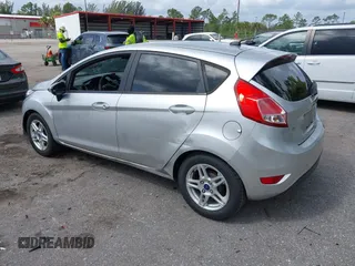 2017 Ford Fiesta SE with VIN 3FADP4EJ2HM116014, listed as a IAAI auction lot 41935876 with 150,435 mi miles. Bid and sale history available at carsss.com. Image 3.