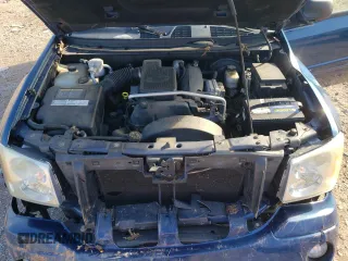 2005 GMC Envoy SLE with VIN 1GKDS13S352369384, listed as a Copart auction lot 79996394 with 117,697 mi miles and Salvage Title. Bid and sale history available at carsss.com. Image 13.