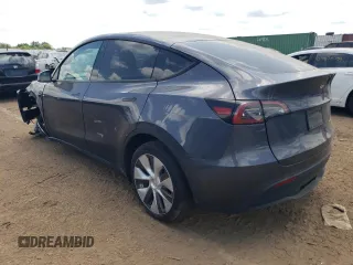 2022 Tesla Model Y Long Range with VIN 7SAYGDEE3NA007737, listed as a Copart auction lot 64602984 with 42,597 mi miles and Salvage Title. Bid and sale history available at carsss.com. Image 2.