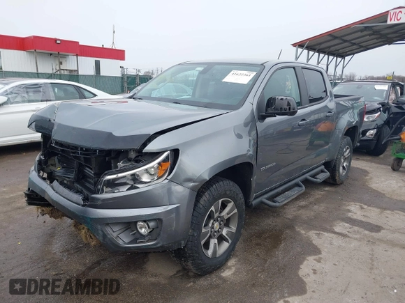 2020 Chevrolet Colorado 4WD Z71 with VIN 1GCGTDEN3L1154721, listed as a IAAI auction lot 41622361 with 64,628 mi miles and . Bid and sale history available at DreamBid. Image 2.