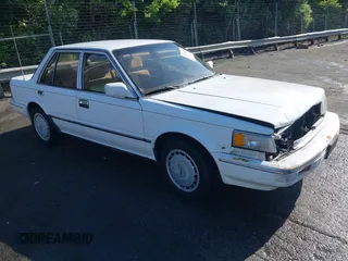 1988 Nissan Maxima with VIN JN1HU11PXJT618115, listed as a IAAI auction lot 42166117 with 205,349 mi miles and . Bid and sale history available at DreamBid. Image 1.