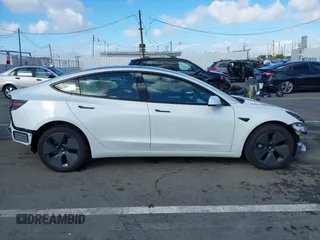2023 Tesla Model 3 with VIN 5YJ3E1EA6PF495631, listed as a IAAI auction lot 41568118 with 10,073 mi miles and . Bid and sale history available at DreamBid. Image 14.