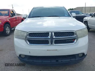 2013 Dodge Durango SXT with VIN 1C4RDHAG4DC667776, listed as a IAAI auction lot 42656299 with 204,181 mi miles and . Bid and sale history available at DreamBid. Image 12.