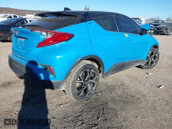 2019 Toyota C-HR XLE with VIN JTNKHMBX9K1056627, listed as a IAAI auction lot 41030089 with 1 mi miles. Bid and sale history available at carsss.com. Image 4.