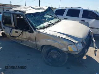 2004 Ford Explorer Sport Trac XLS z VIN 1FMZU67K74UC30067, wystawiony jako IAAI lot #41680436 z przebiegiem Nie podano mil oraz . Historia ofert i sprzedaży dostępna na DreamBid. Obrazek 1.