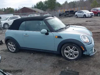 2013 MINI Cooper Convertible with VIN WMWZN3C53DT135427, listed as a IAAI auction lot 41954817 with 57,029 mi miles. Bid and sale history available at carsss.com. Image 14.